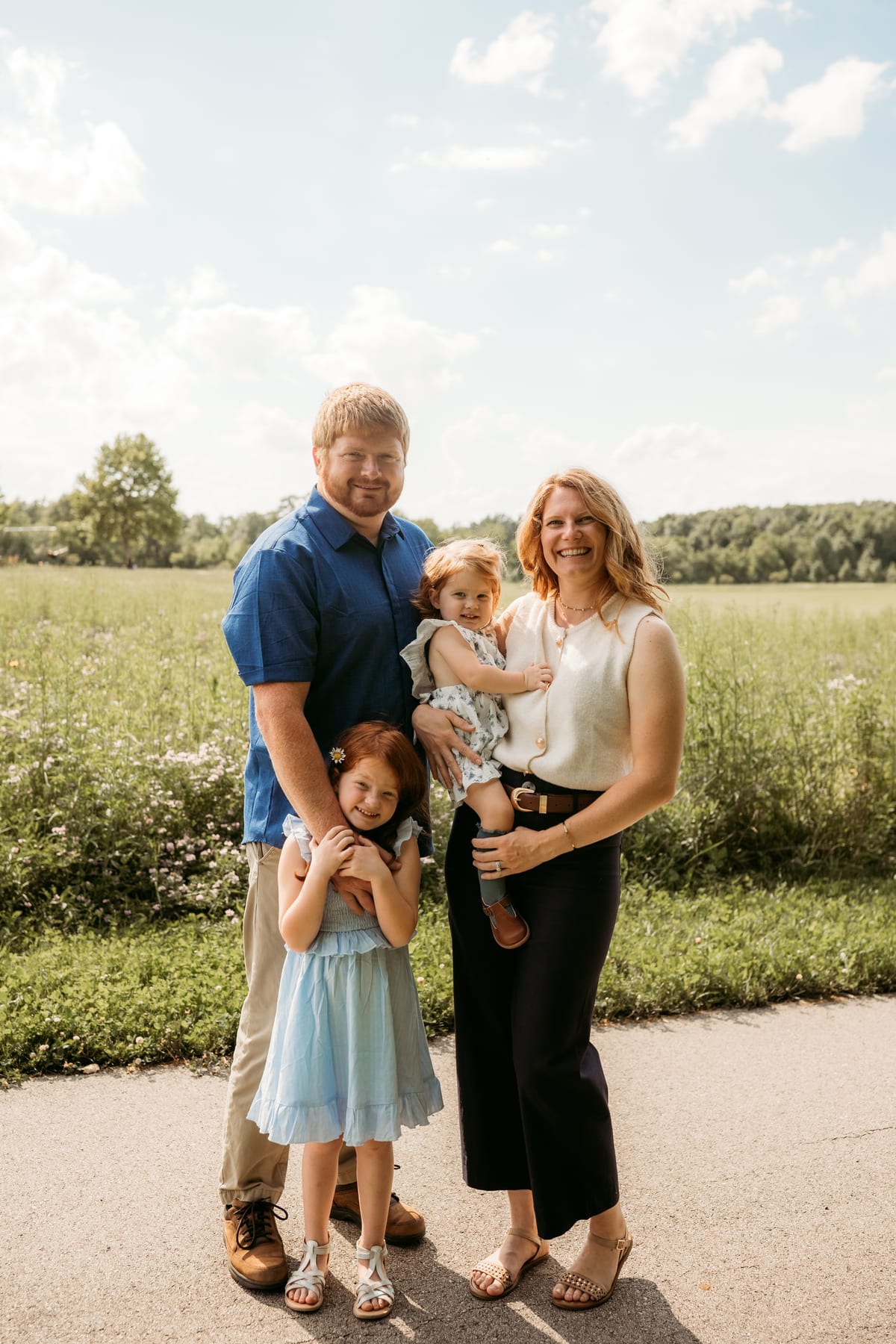 Tashina and Herb with their two daughters at the farm